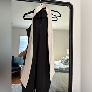 Trina Turk Black and White Cross over halter dress with satin bow. Worn once